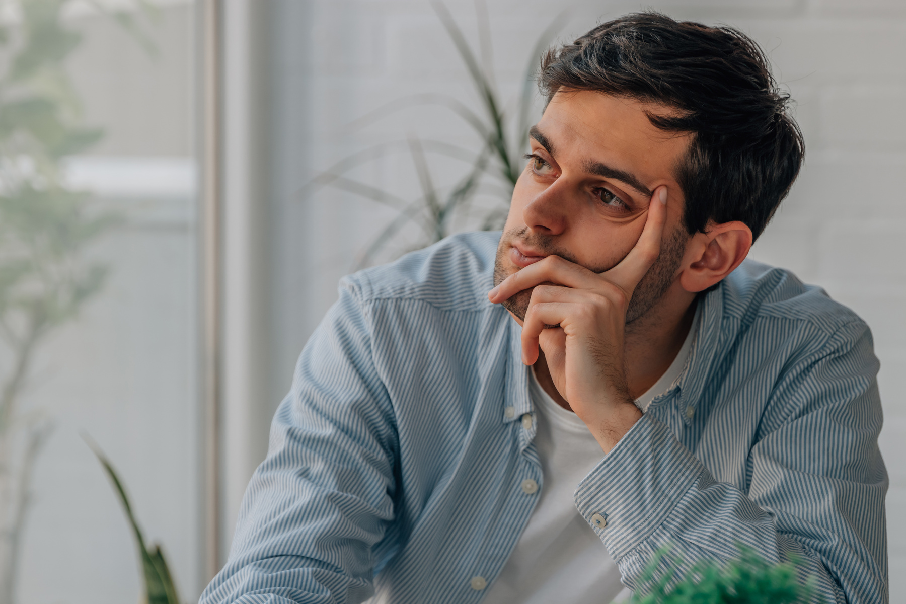 thoughtful young man making decision